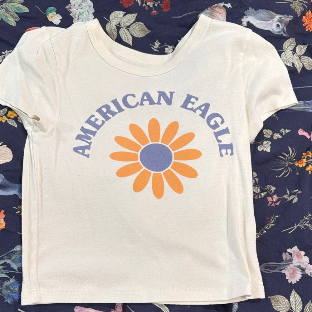 American Eagle Outfitters Kids Cream Tee with Orange and Blue Design